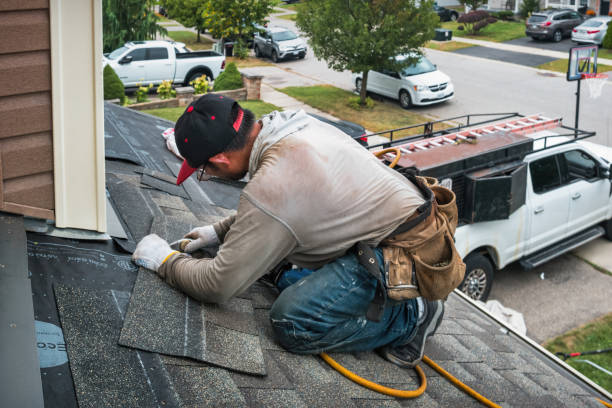 Professional Roof Replacement technician working in Plain, WI